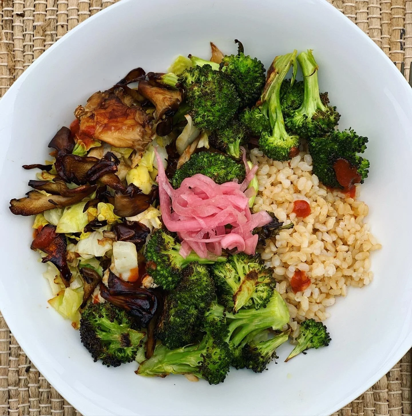 Savory buddha bowl with pickled red onion