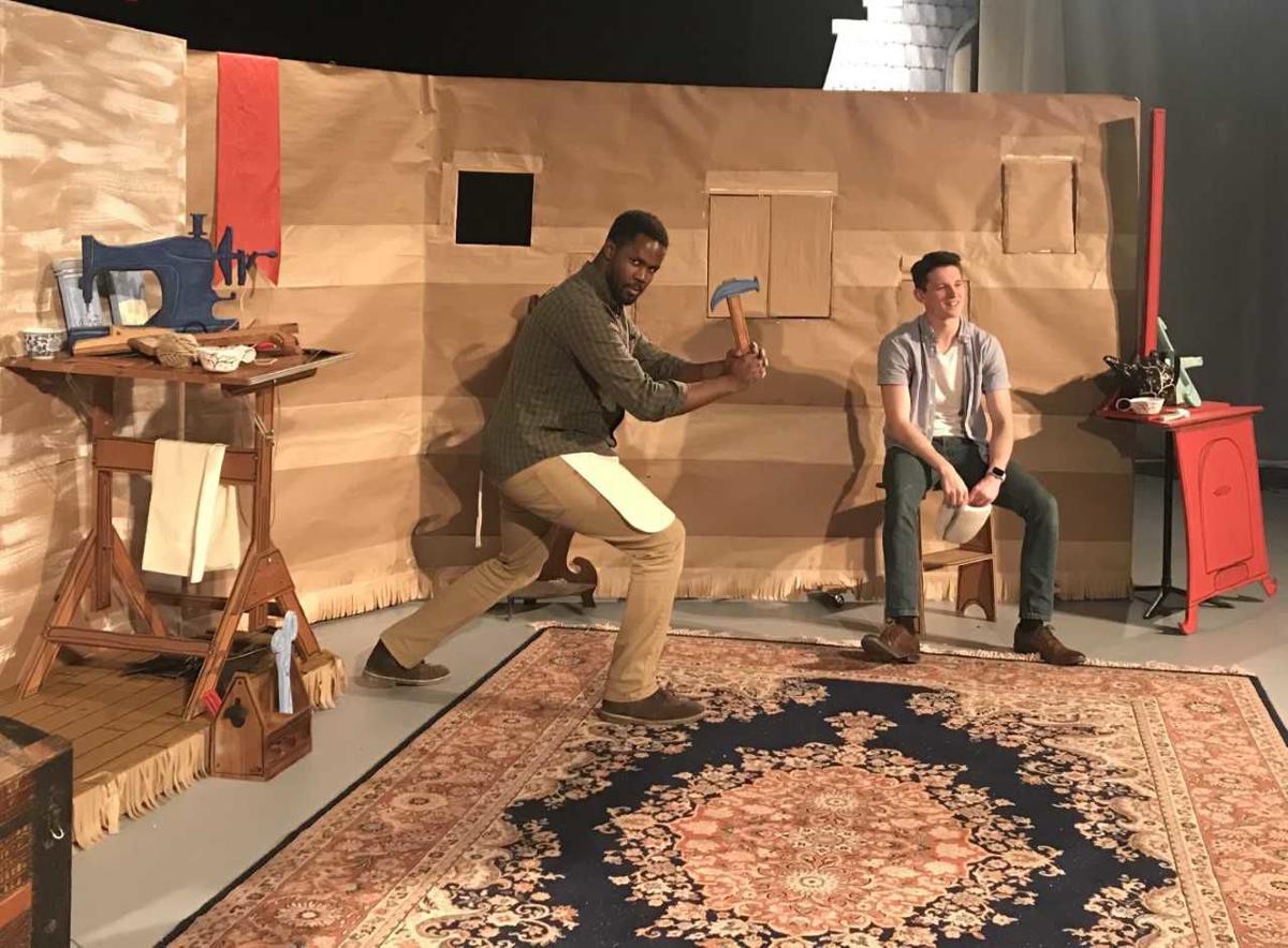 Senior music major John Mburu, left, and junior music performance major Bryce Redick, right, on the set of “What Men Live By.” Photo by Kenzie Jade, Staff Reporter