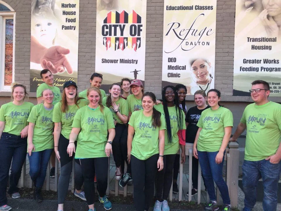 Students, like the ones pictured above, volunteered at various locations throughout Georgia and Tennessee. Courtesy of Rick Harris