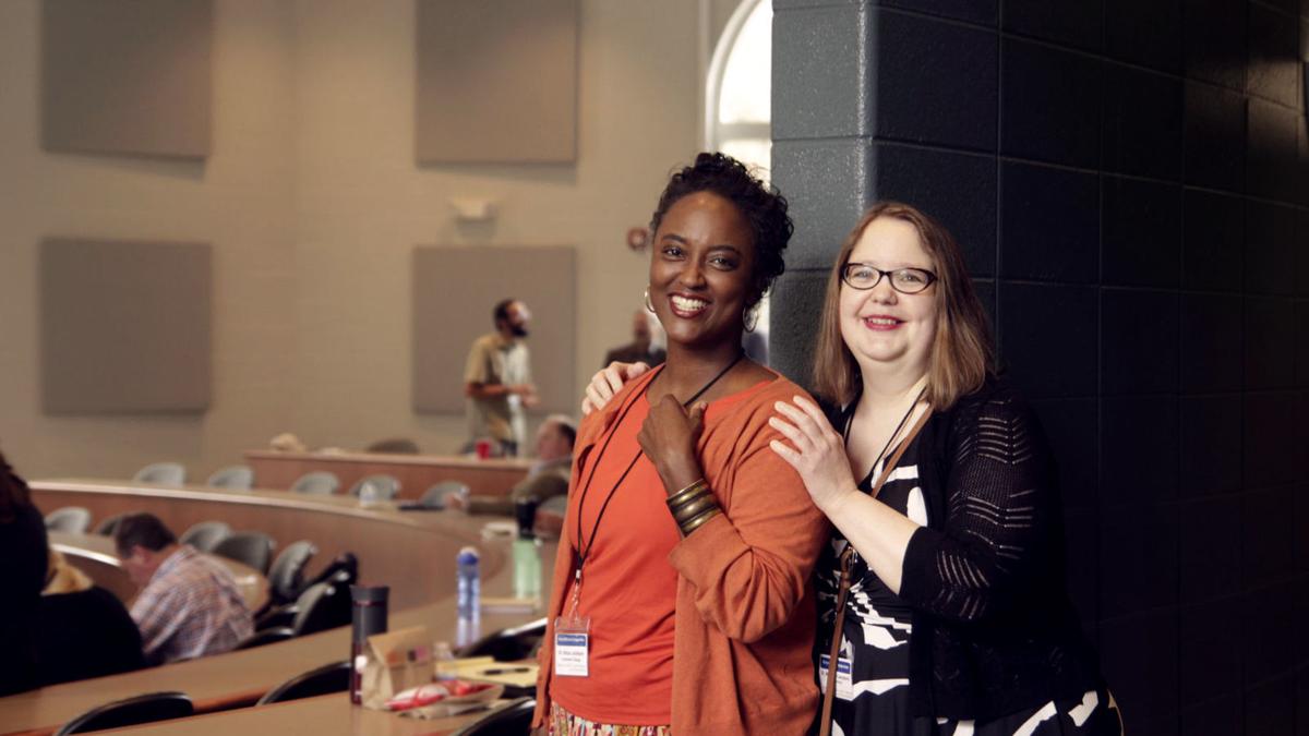 Dr. Alicia Johnson (left) was the keynote speaker for the symposium, which focused on race relations nationwide. Courtesy of Julia Emerson