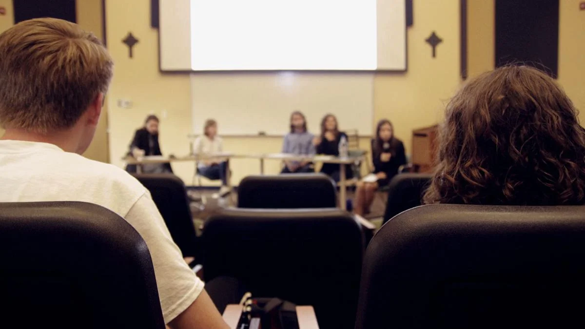 Students attending the School of Religion’s Coffee, Cake and Theology listen to a panel of students discuss why Millennials are leaving the church. Courtesy of Julia Emerson