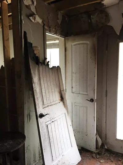 The door to the balcony off the front bedroom where the fire started.