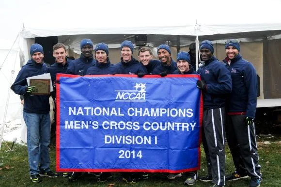 The Men's Cross Country Team celebrates the NCCAA National Championship win.Photo Courtesy of Sports Information.