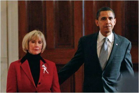 Lilly Ledbetter and Barack Obama (Photo: Bloomberg News)