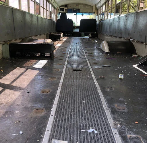 Inside of the school bus the Hamons bought, before renovations began. Photo courtesy of Serenity Bus Project Instagram.