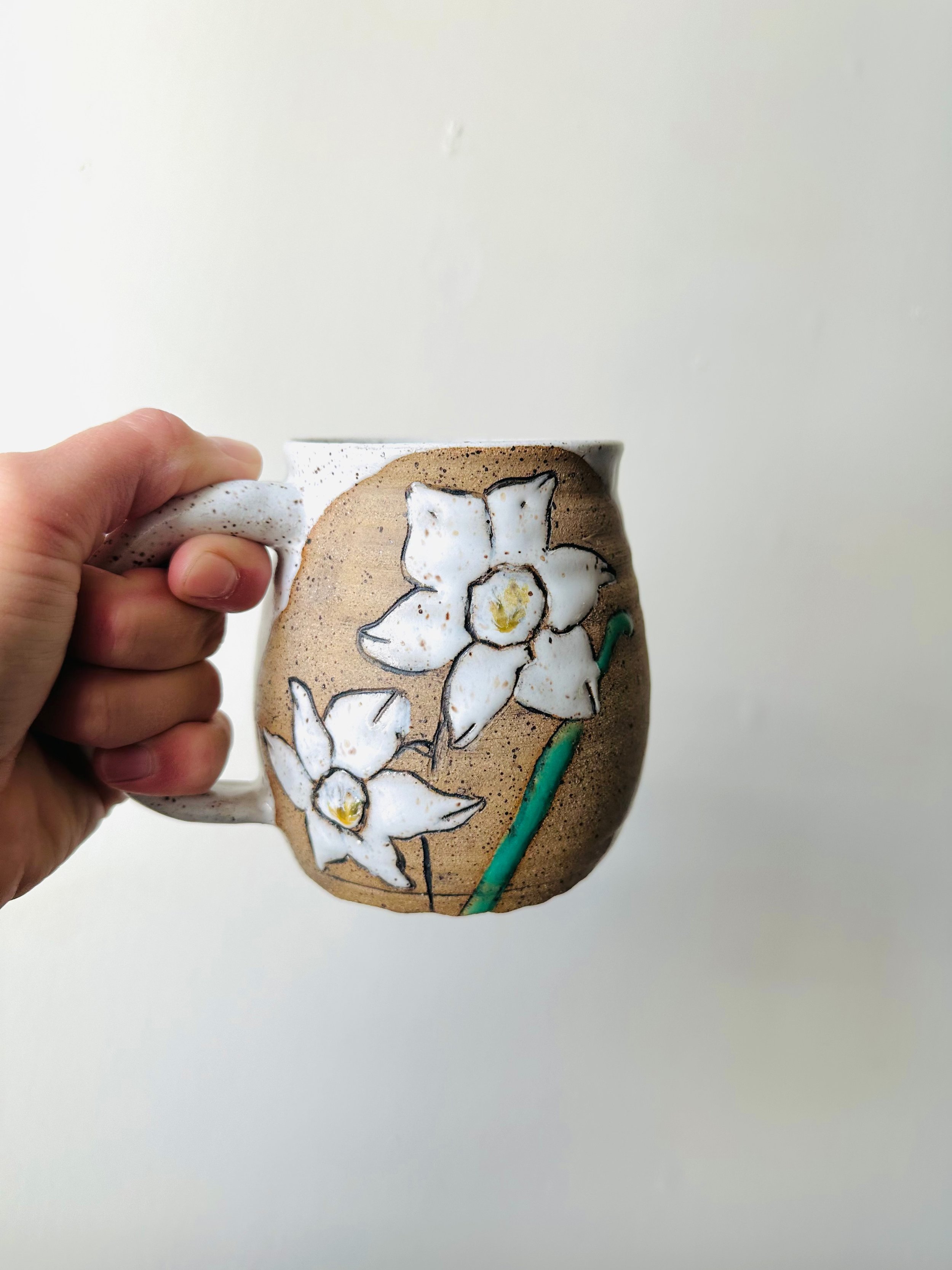 Front-View-of-December-Birth-Flower-Handmade-Mug.jpg