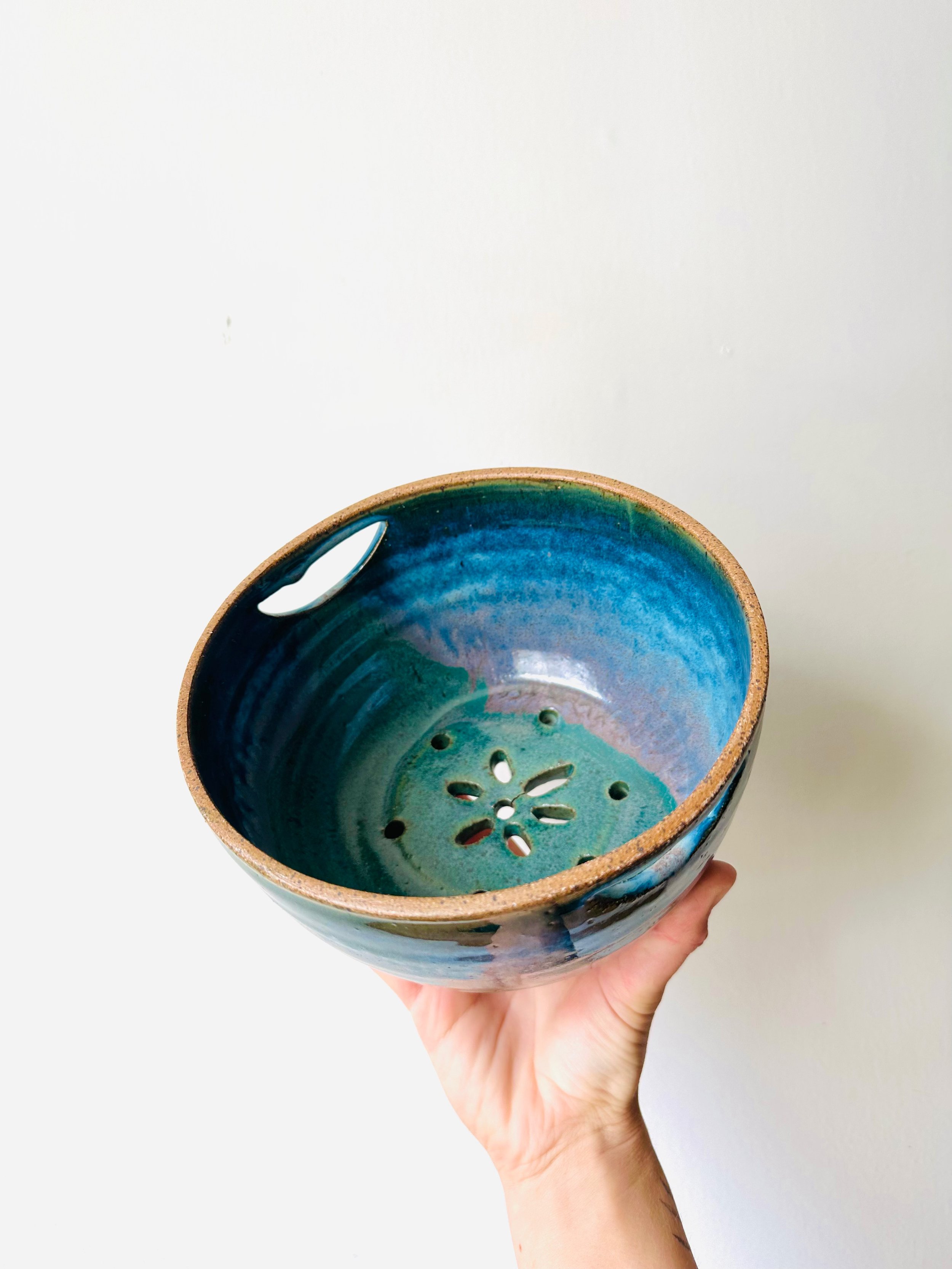Tilted-View-of-Blue-Green-Flower-Strainer-Bowl.jpg