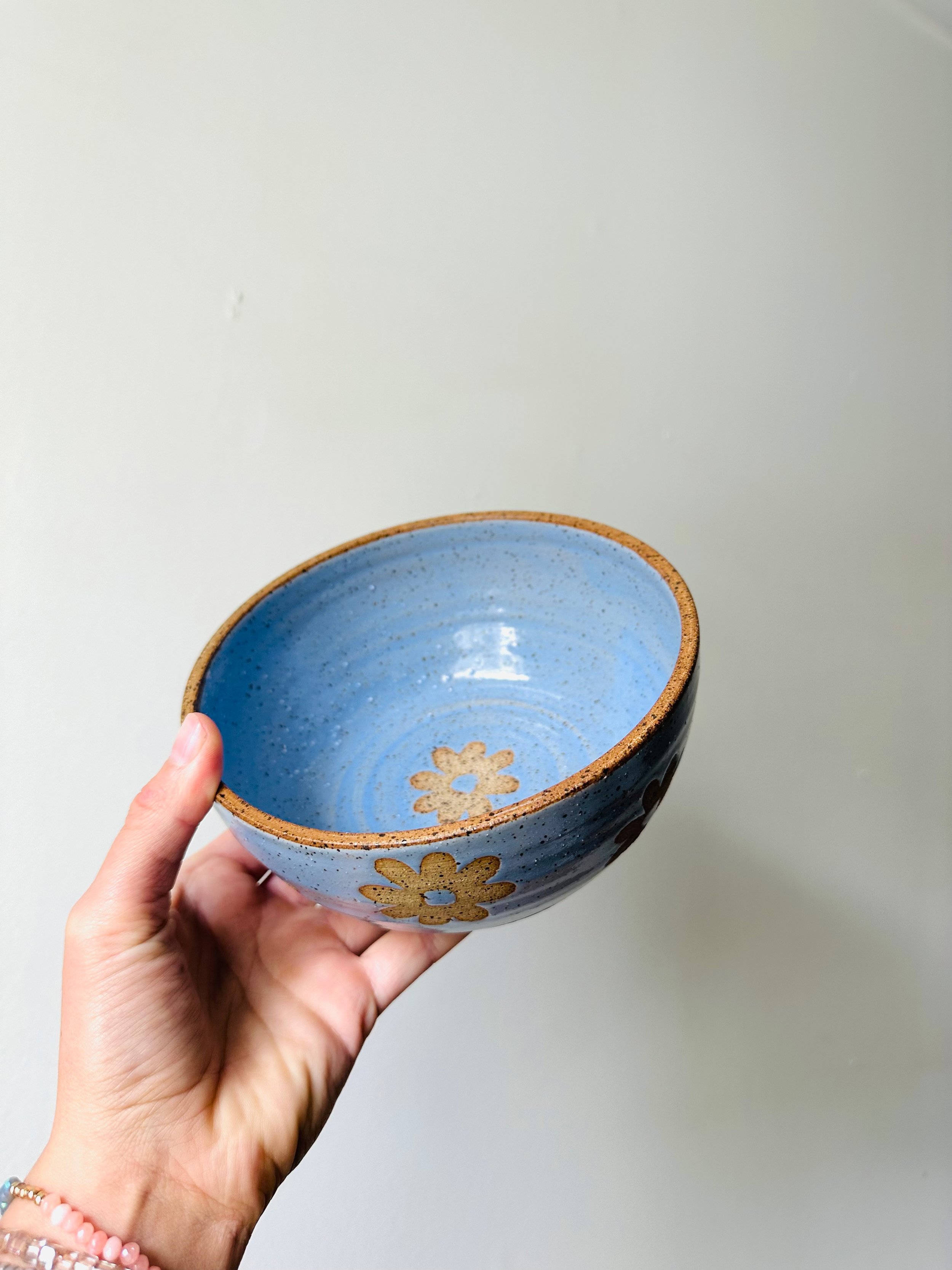 Tilted-View-of-Periwinkle-Daisy-Medium-Sized-Ceramic-Bowl.jpg