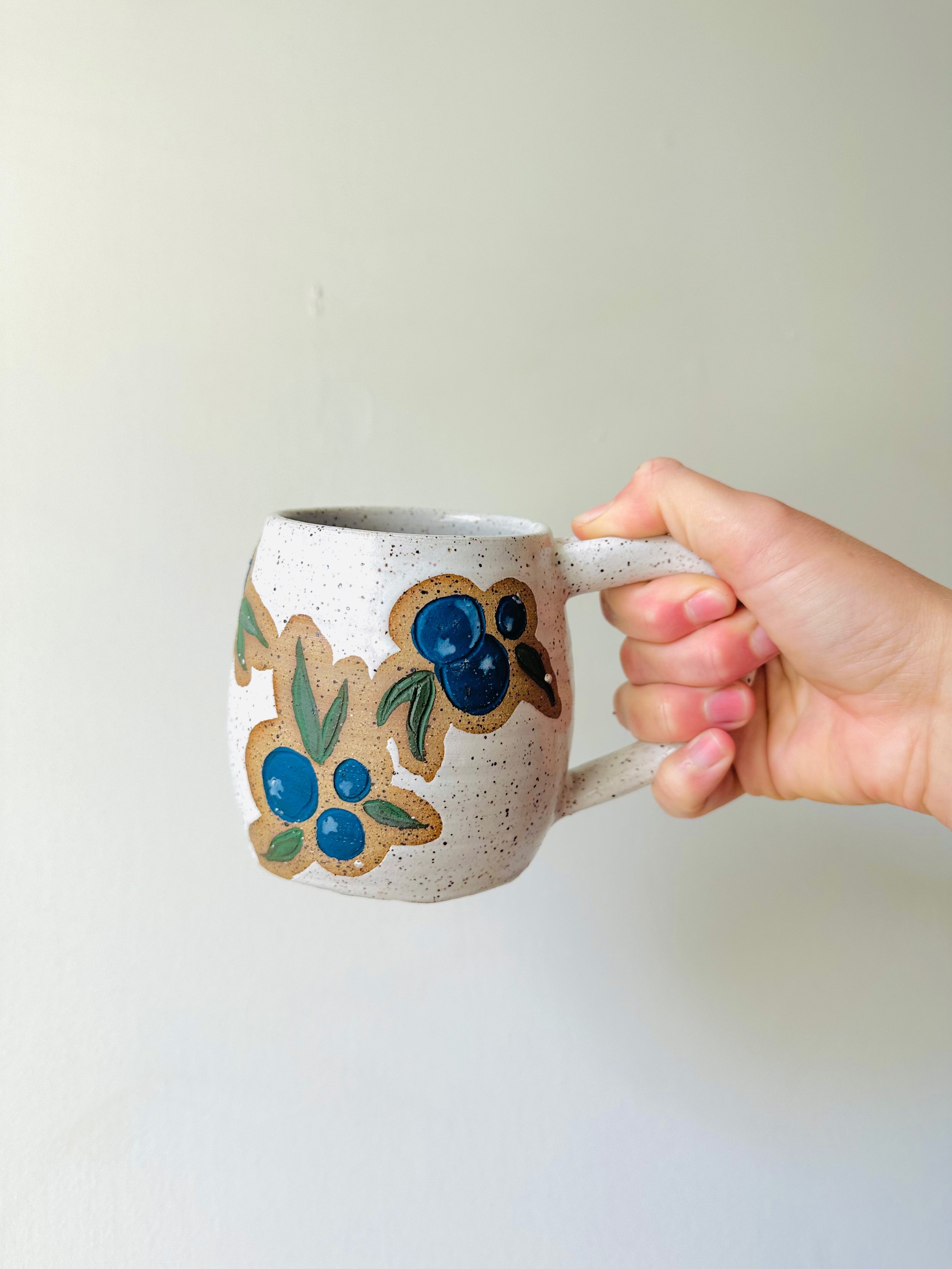 Holding-View-Handmade-Ceramic-Blueberry-Mug.jpg