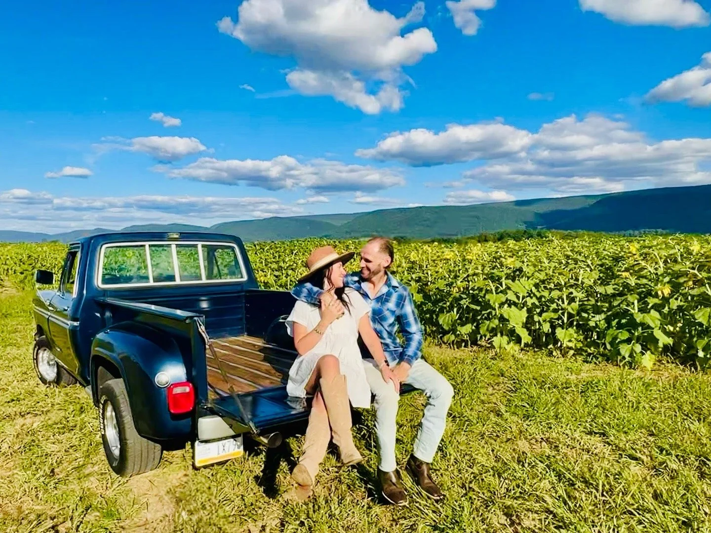Jillia and Wyatt at Sunflower Field with Old Ford