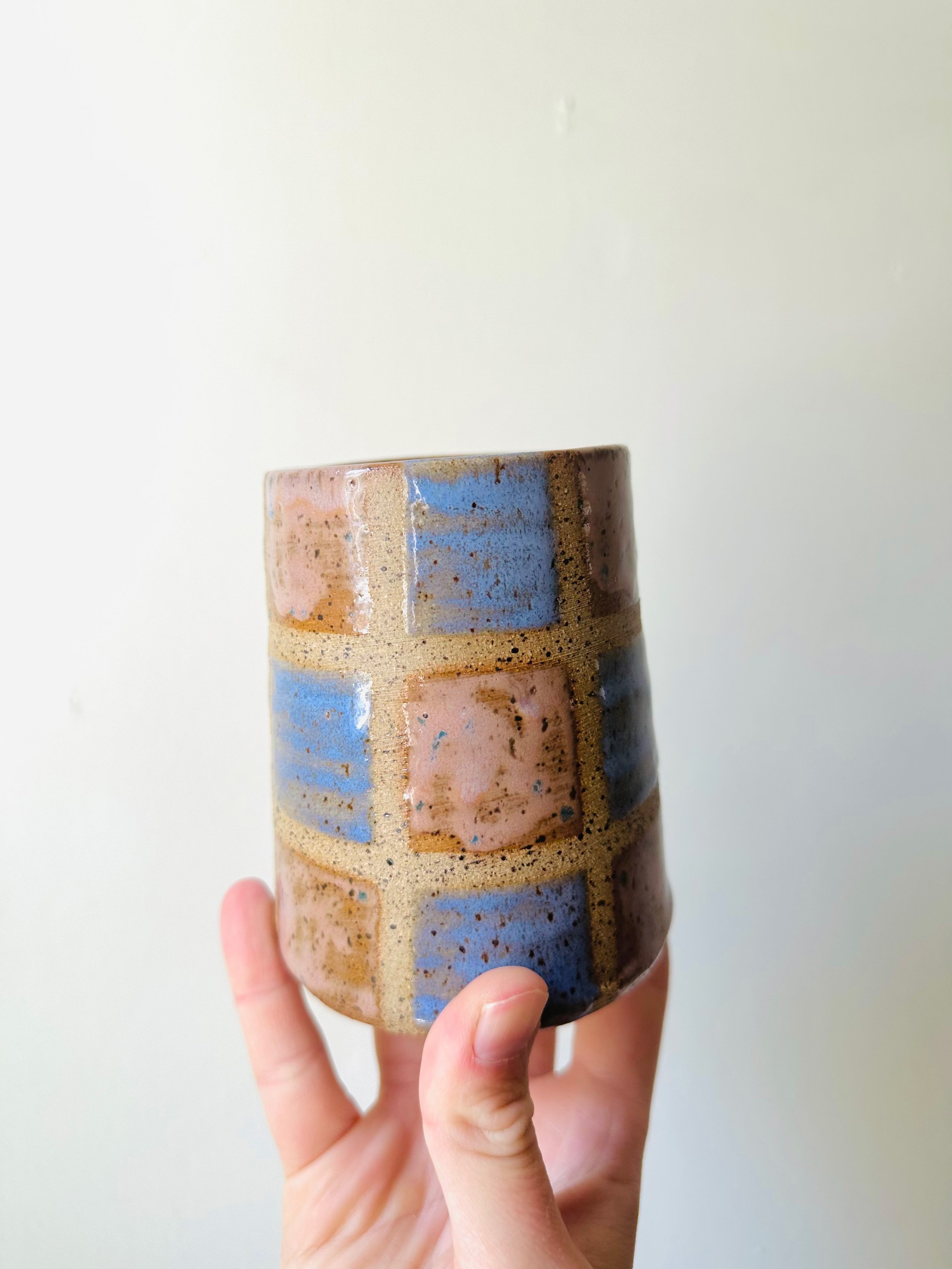 Close-Up--View-of-Hand-Painted-Handmade-Checkered-Print-Tumbler.jpg