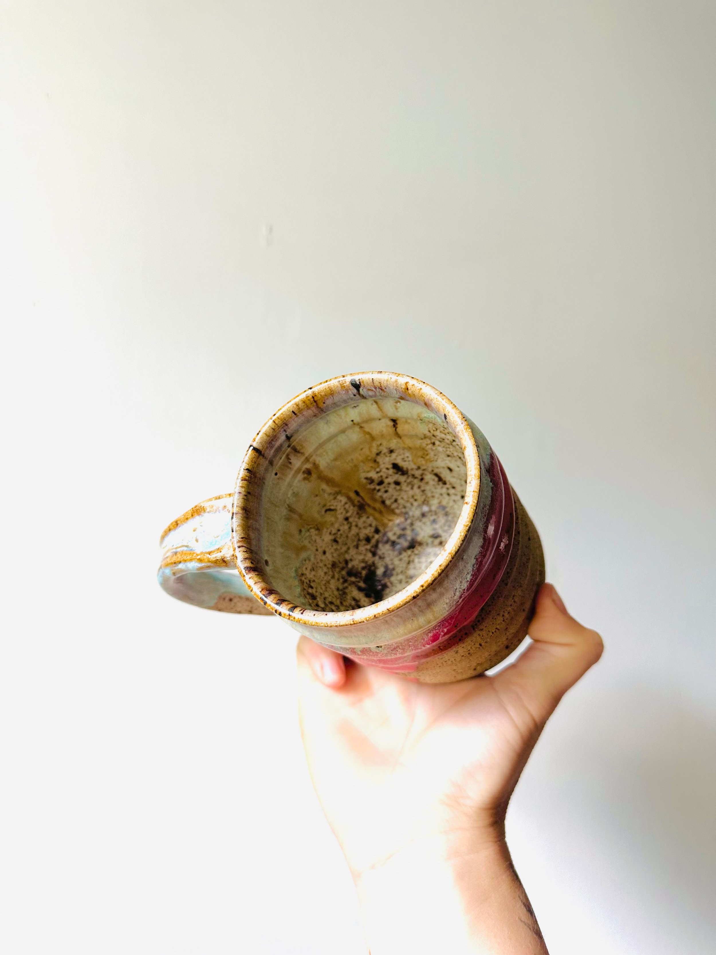 Inside-View-of-Pink-Blue-Dripping-Glaze-on-Handmade-Ceramic-Mug.jpg