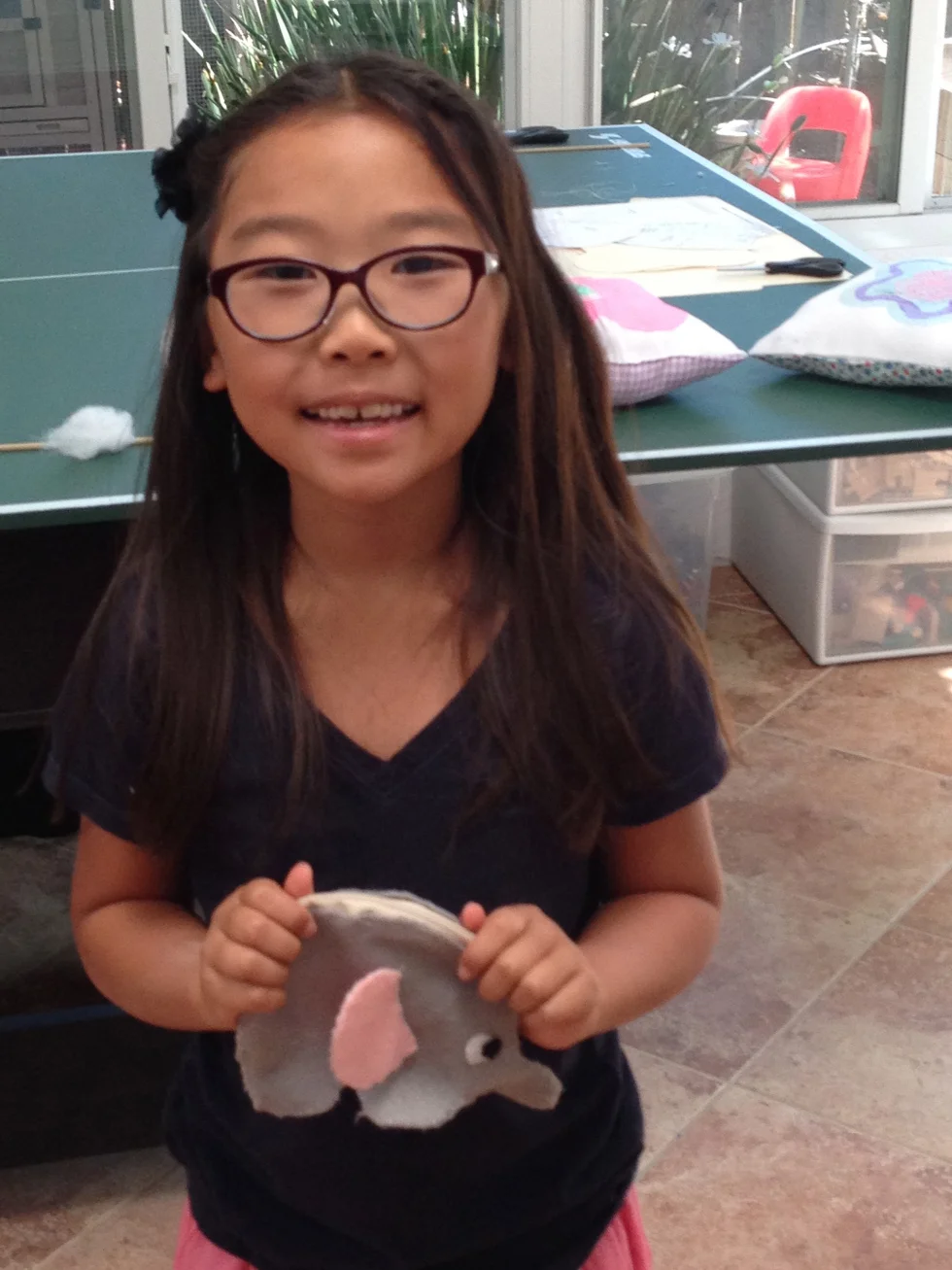 3rd grader elephant coin purse.