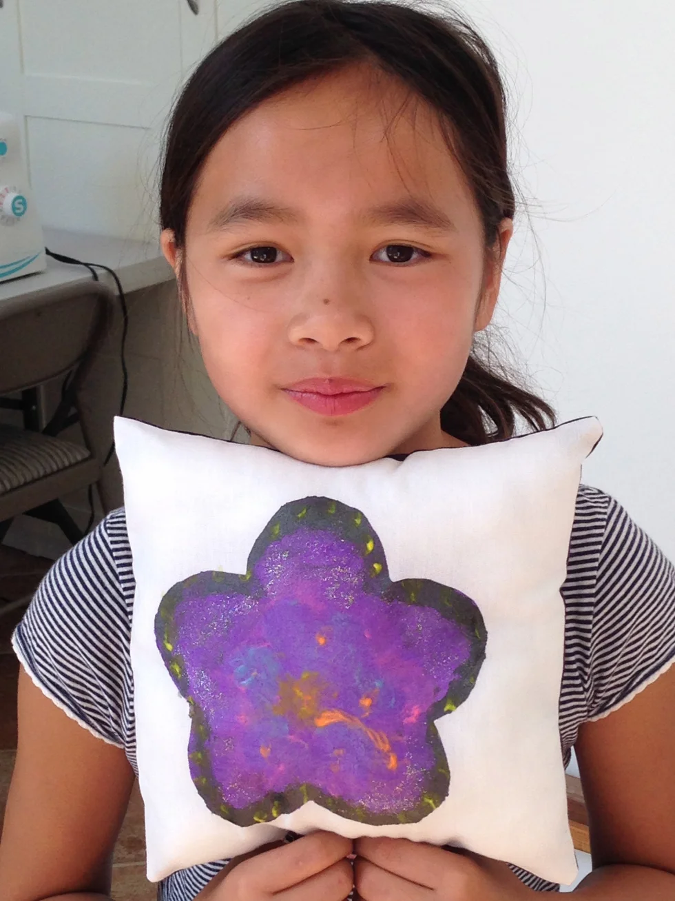 4th grader fabric painted pillow.