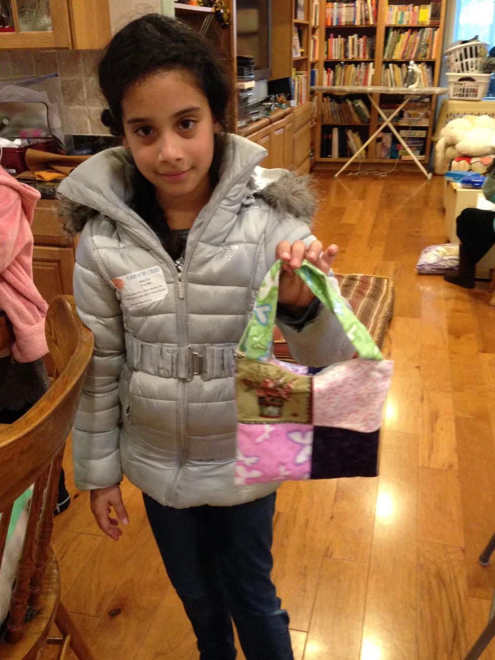 Completely lined purse with a zippered closure by a 3rd grader.