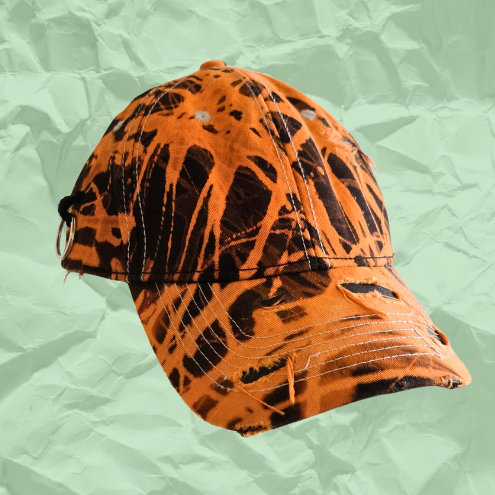Mum's Basement Orange Bleach dye hat f.png