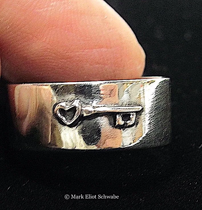 3-silver_ring_BACK_with_SILVER_key_black_background©.JPG