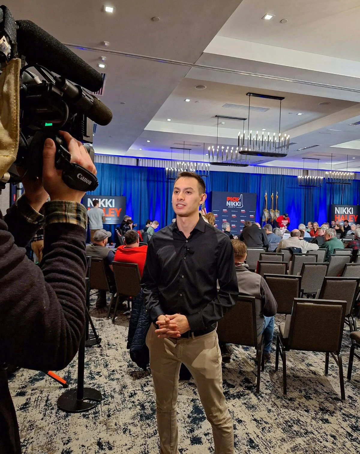 Tyler reporting at Nikki Haley event edited photo.jpeg