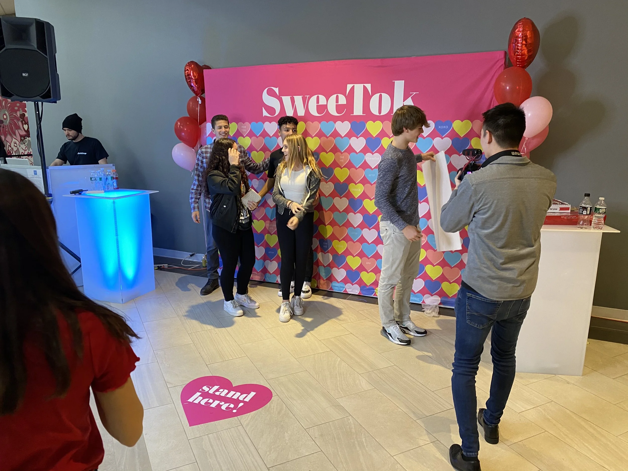 Tyler filming the Social Media Creators he worked for at their meet and greet event.JPG