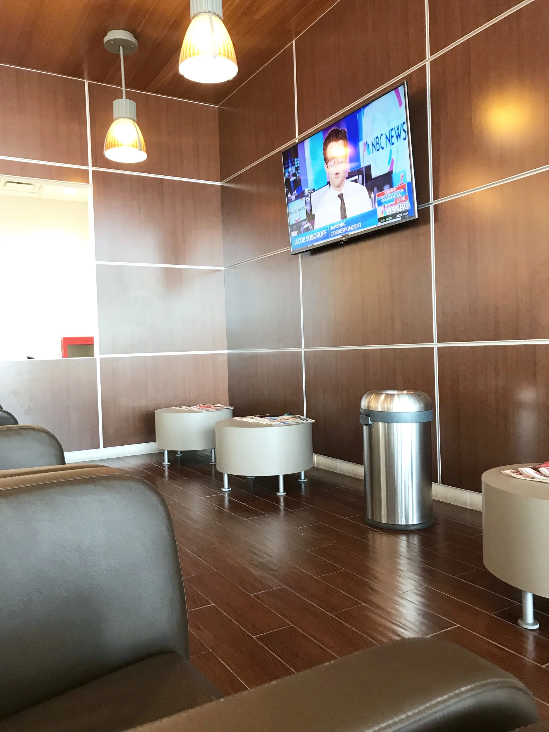 The waiting area of the local dealership’s service department.