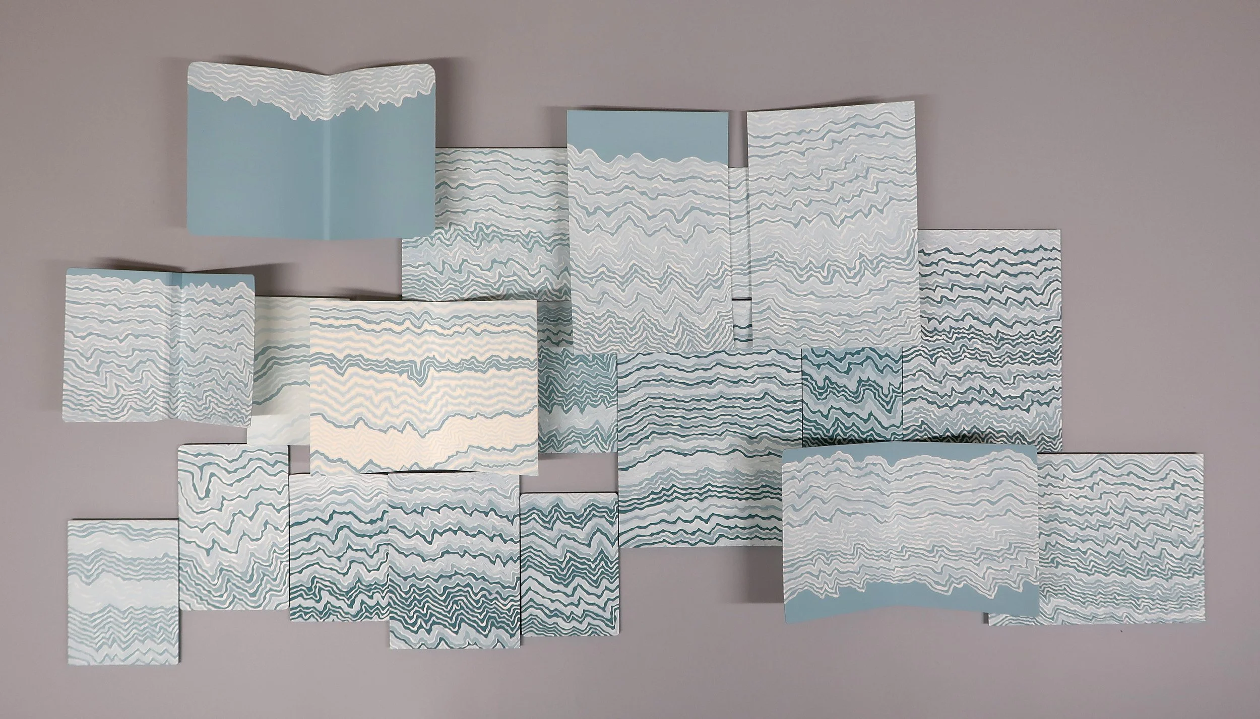    untitled (leave no trace II)  , 2025-XXXX, Recycled Interior House Paint Recycled Matte Board Mounts, 31.125 × 56.25 × 3.5”, total installation dimensions &amp; layout vary 