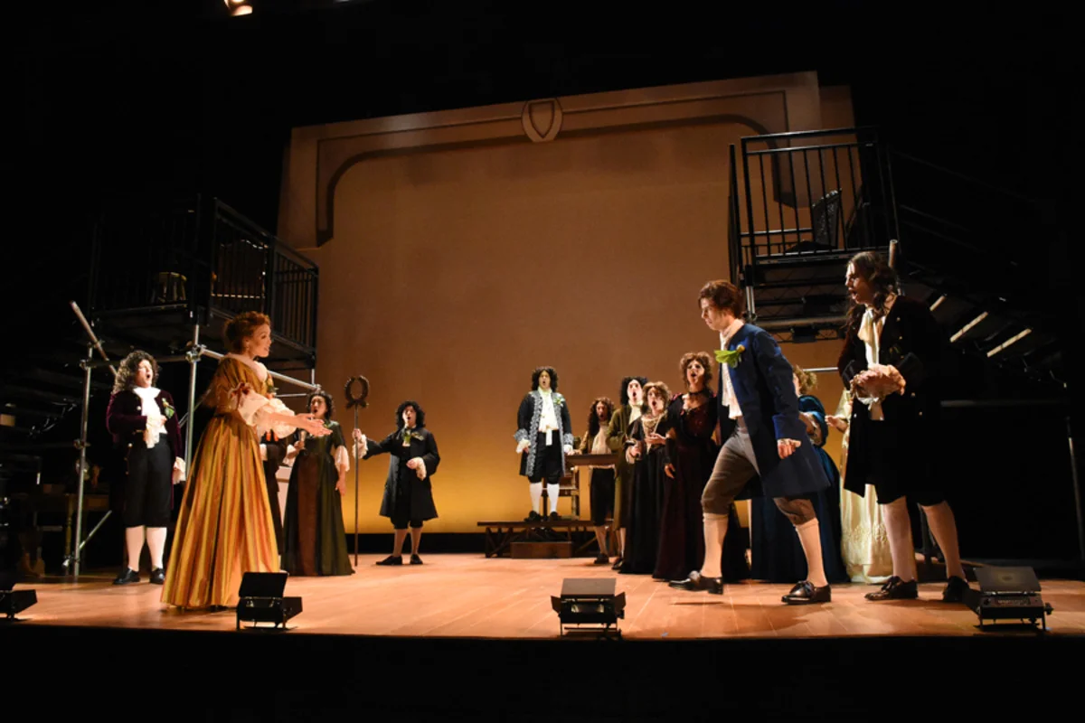 Margaret (J. Sandidge), Kynaston (S. Owens), Villiers (J. Kaneklides) in foreground while palace court looks on - Photo by Tina Buckman