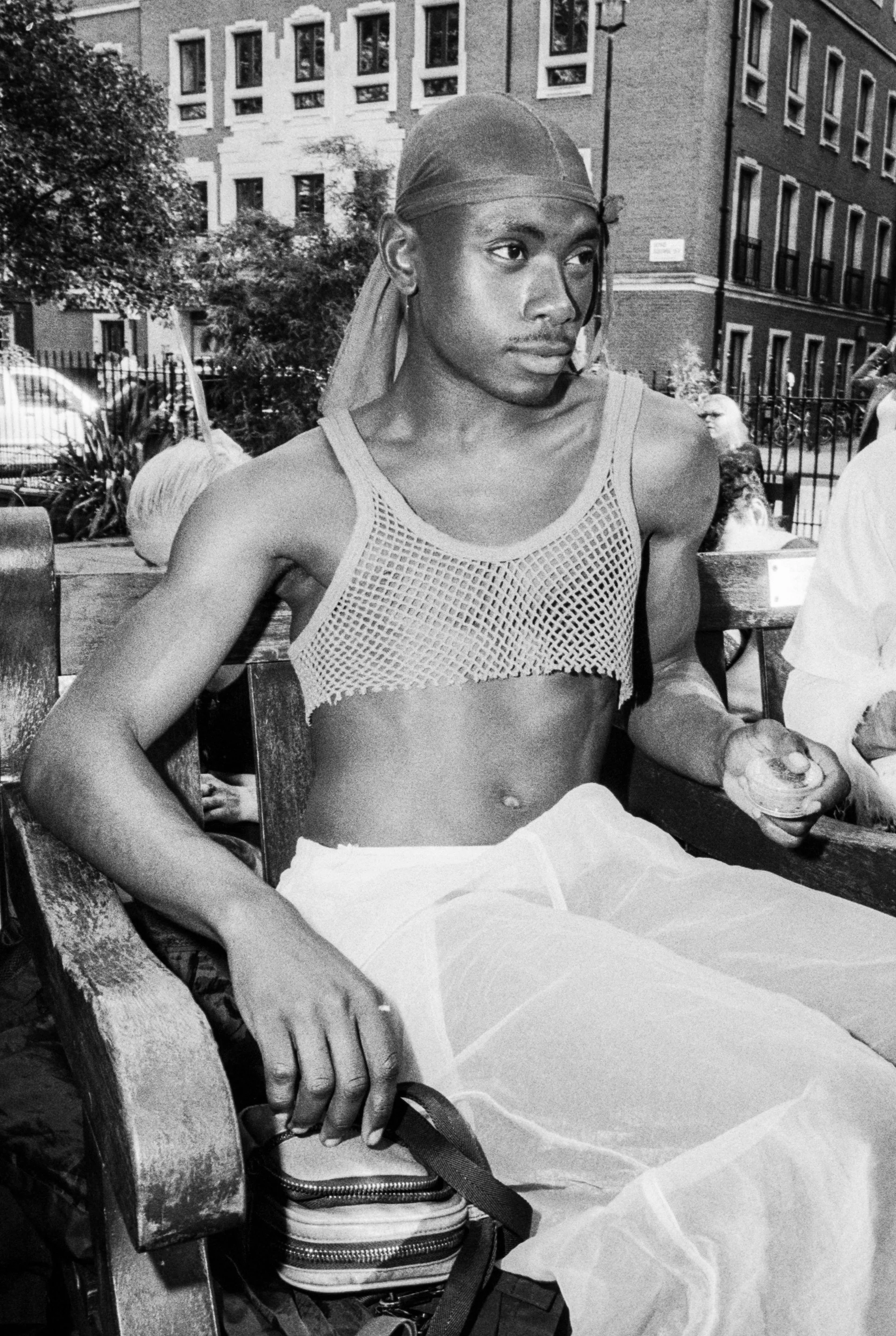 sitting man at trans pride.jpg