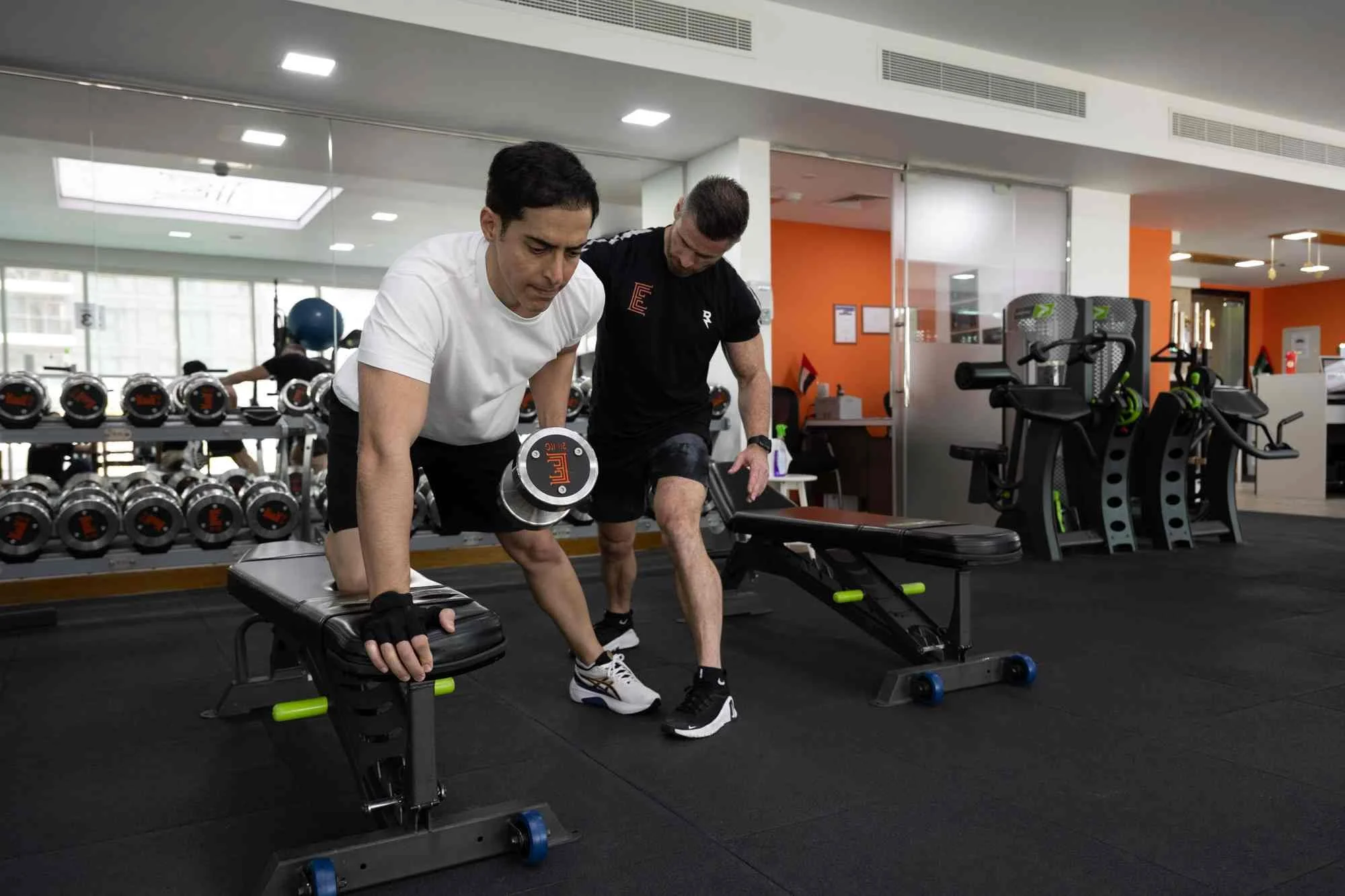 Person in a Abu Dhabi Mixed Gym Doing Dumbbell Rows.jpg