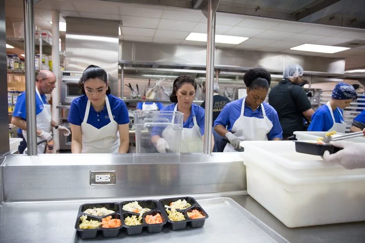 Volunteers prepare meals for delivery at Project Angel Food in Los Angeles. The photo was taken after a press conference on May 4, 2018, announcing the beginning of a pilot program to deliver low-sodium meals to people with congestive heart failure …