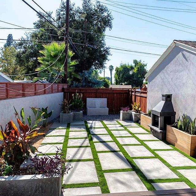 This was a fun project we completed a while back. Pavers, water fountain, fireplace, concrete &amp; wooden planter boxes included. &bull;
&bull;
&bull;

#cabinetry #knottynuffwood #backyardgoals #moderndesign #interiordesigntrends #displaycase #fresh