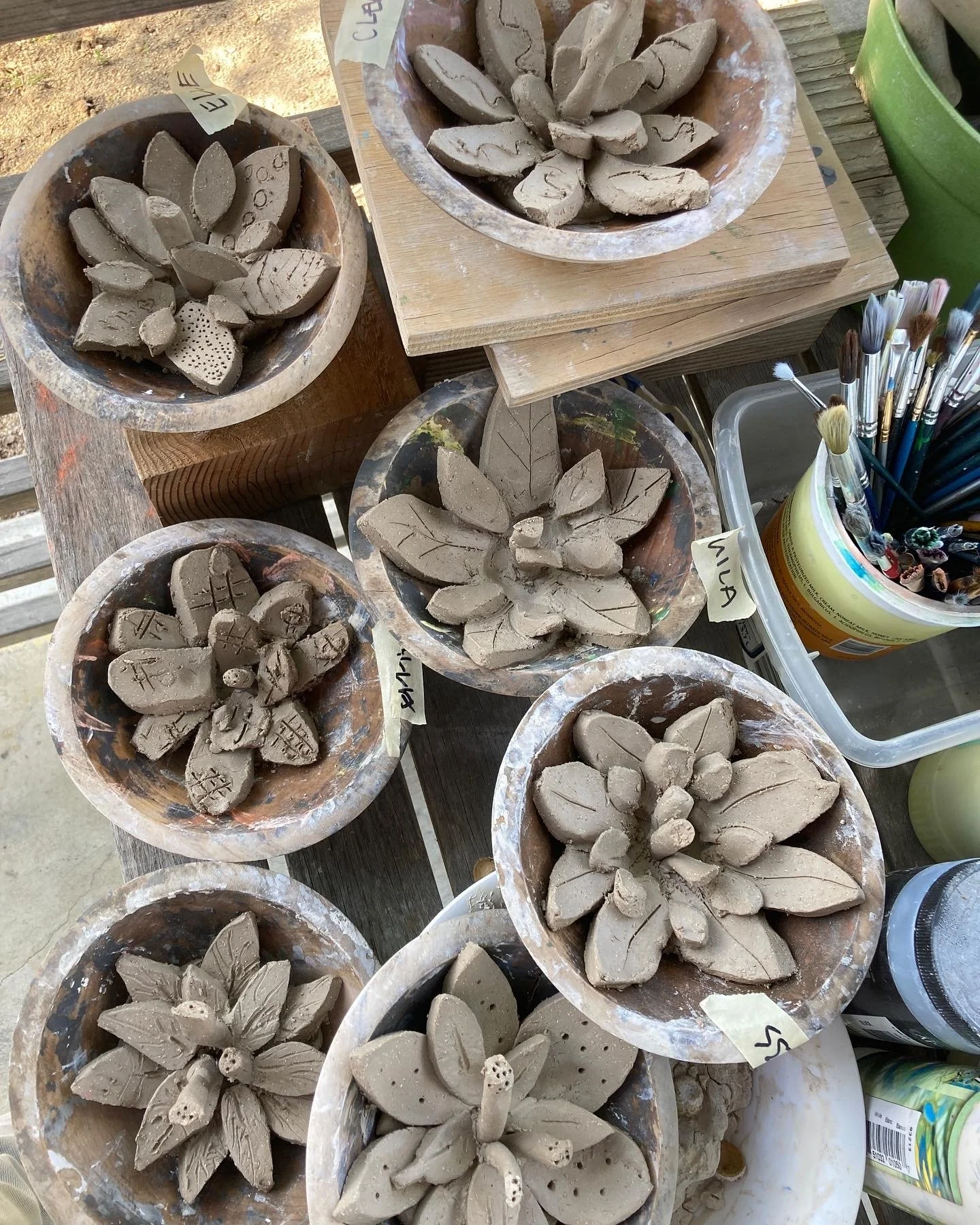  Clay flowers waiting to be glazed and fired 