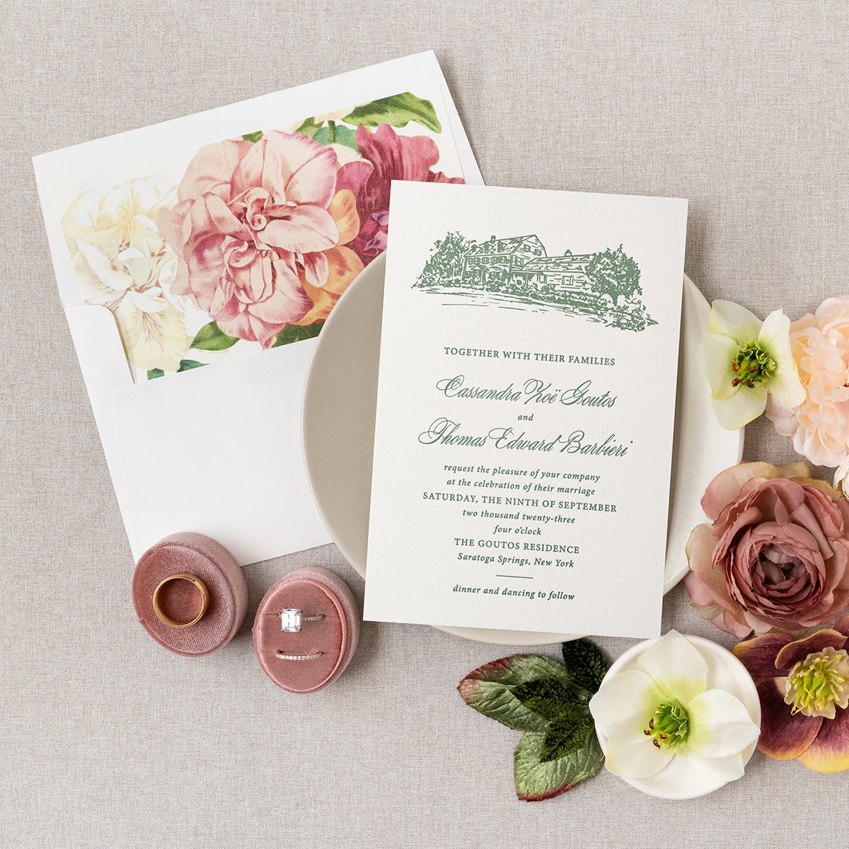 Moss green letterpress invitation with custom home illustration and floral envelope liner