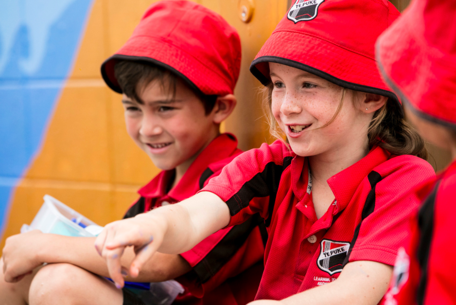 Wearing a hat to be a sun smart role model..