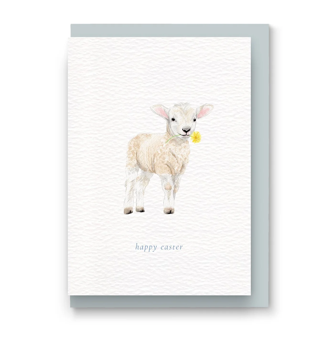 This Easter lamb card includes a cute painting of a baby lamb chewing a yellow dandelion. The message happy easter is printed in blue along the bottom and a light blue envelope is included.