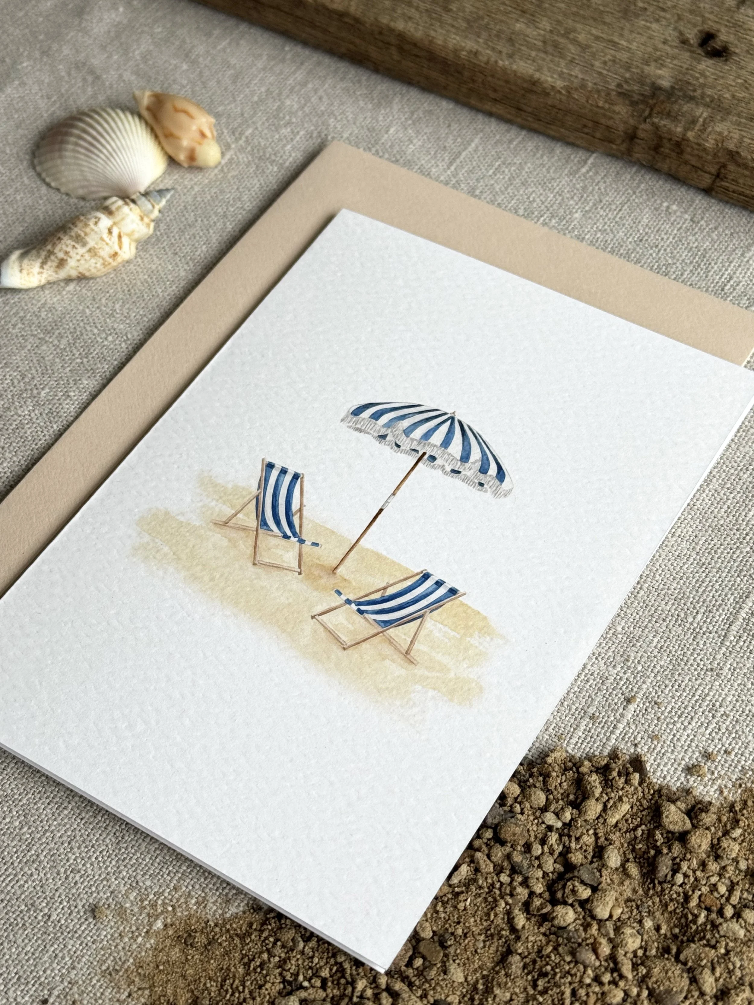 deckchairs and parasol crop.jpg