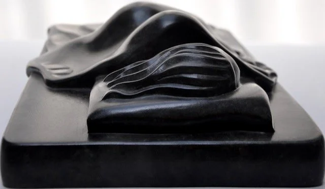 Sleeping -Bronze -  9x33x18cm  - head view  -  Approx: £2800 - according to foundry costs.