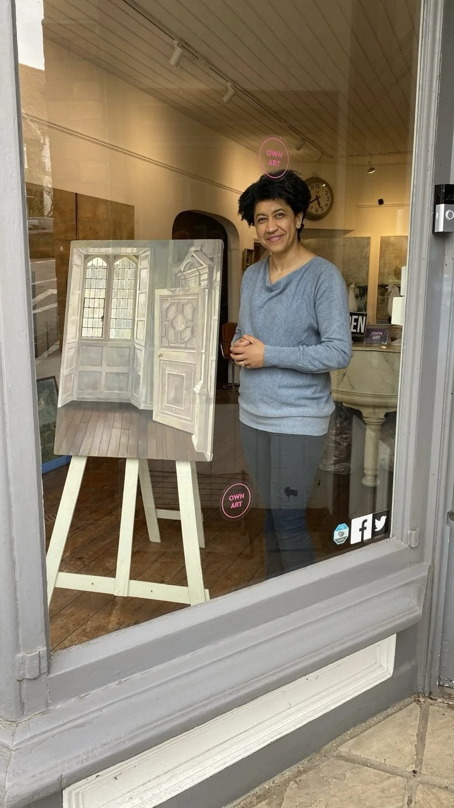Jenny Fay with her painting title The Ornate Door