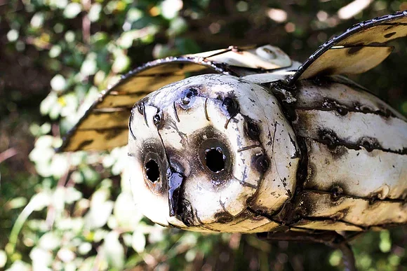 recycled_flying_barn_owl_sculpture