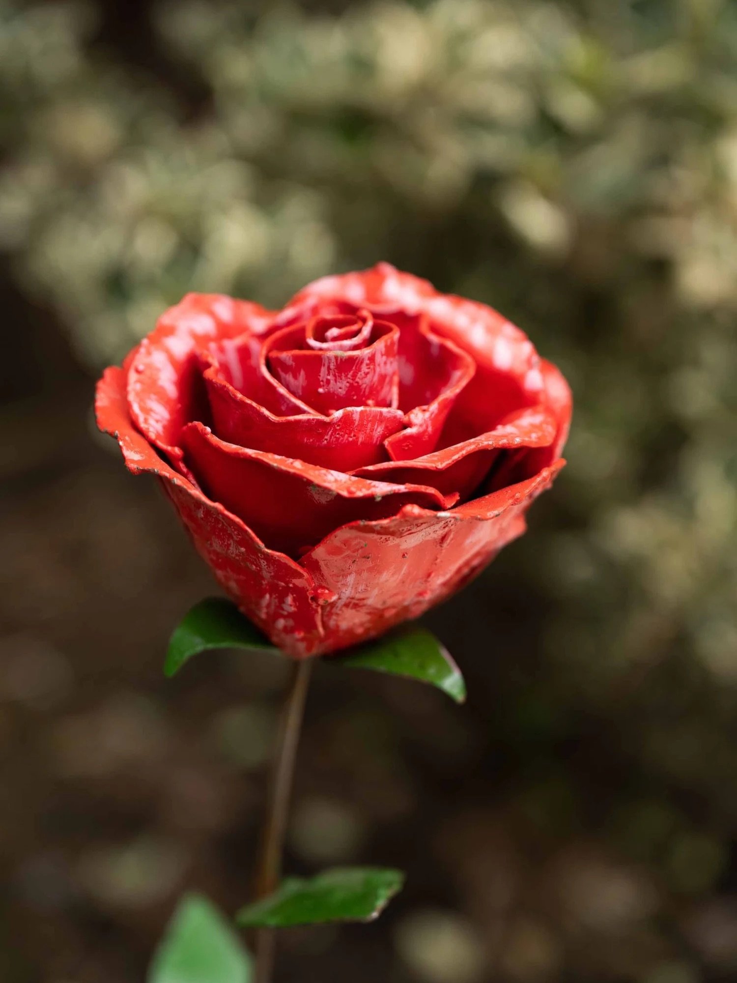 A symbol of love, appreciation and lasting connection, the Rose is the birth flower for June.

Handcrafted in Zimbabwe from recycled metal, our Open Rose captures the beauty of this classic bloom in a form that can be enjoyed year after year. Whether