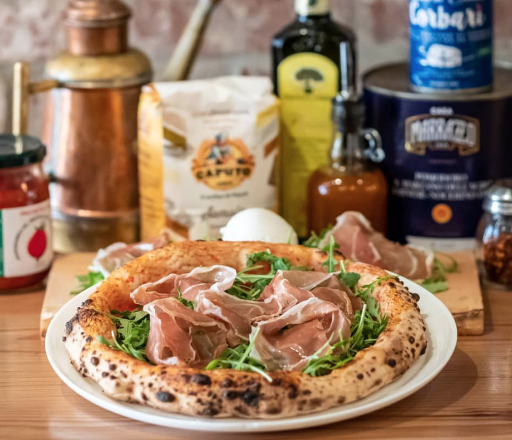 Lucia’s in Berkeley serves wood-fired Neapolitan pizzas, salads &amp; sides.