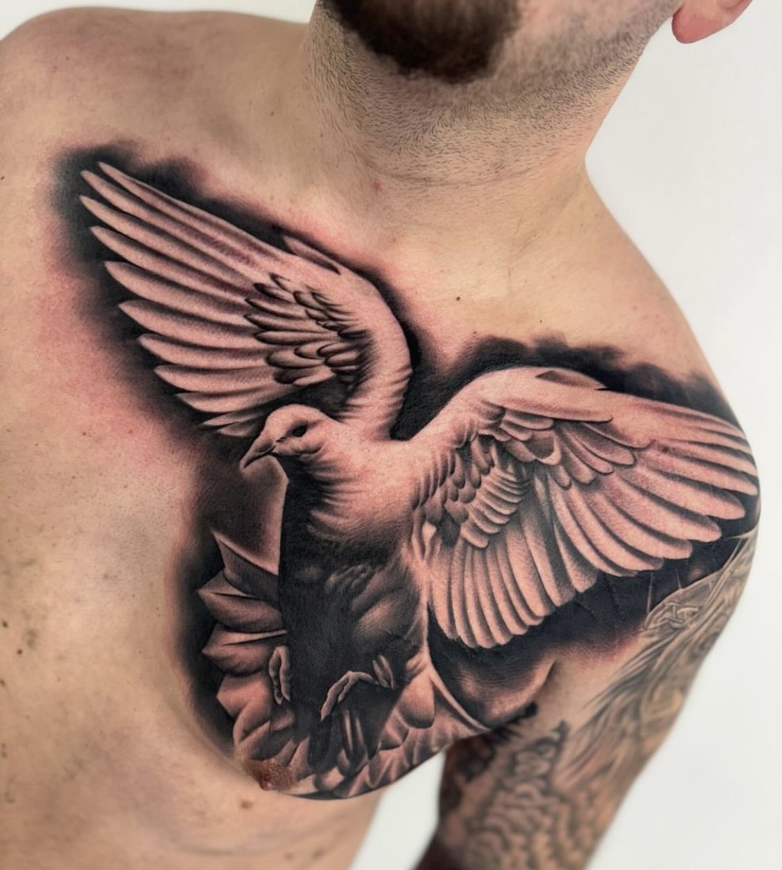 Half chest piece I got to do . Put some praying hands and a dove for my  clients chest. I always enjoy doing this style of tattooing hmu f... |  Instagram