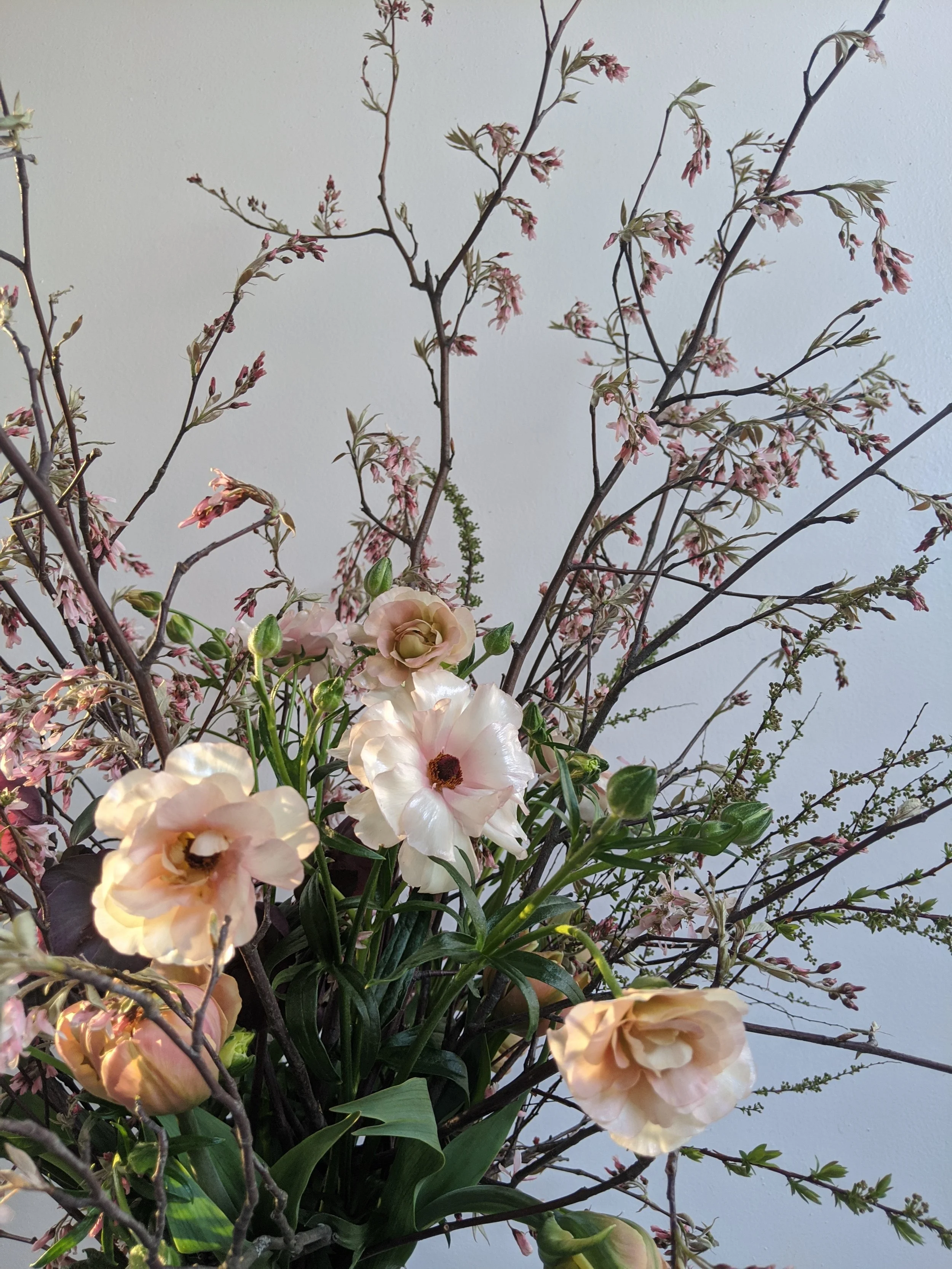  Delicate, soft pink pastel petals in bunched with petite, airy, purple florals   