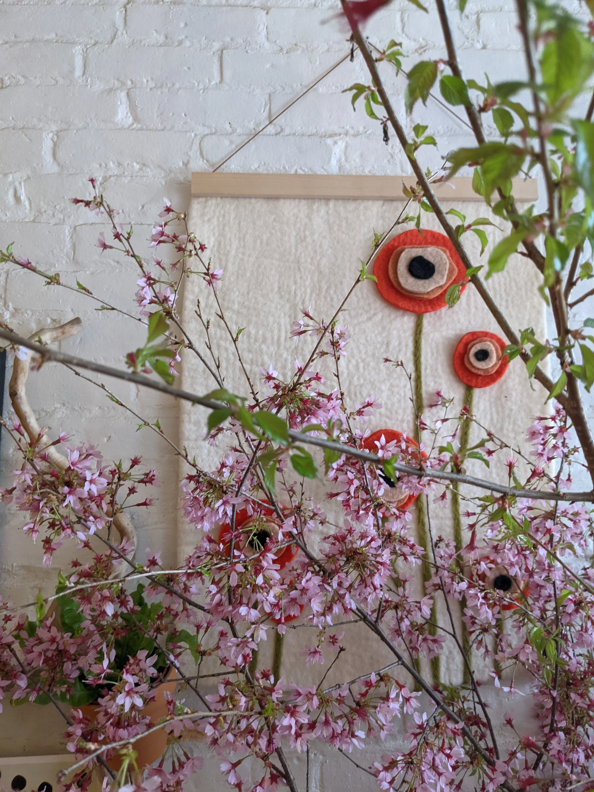  Delicate pink spring cherry flowers offer simple texture to any arrangement 