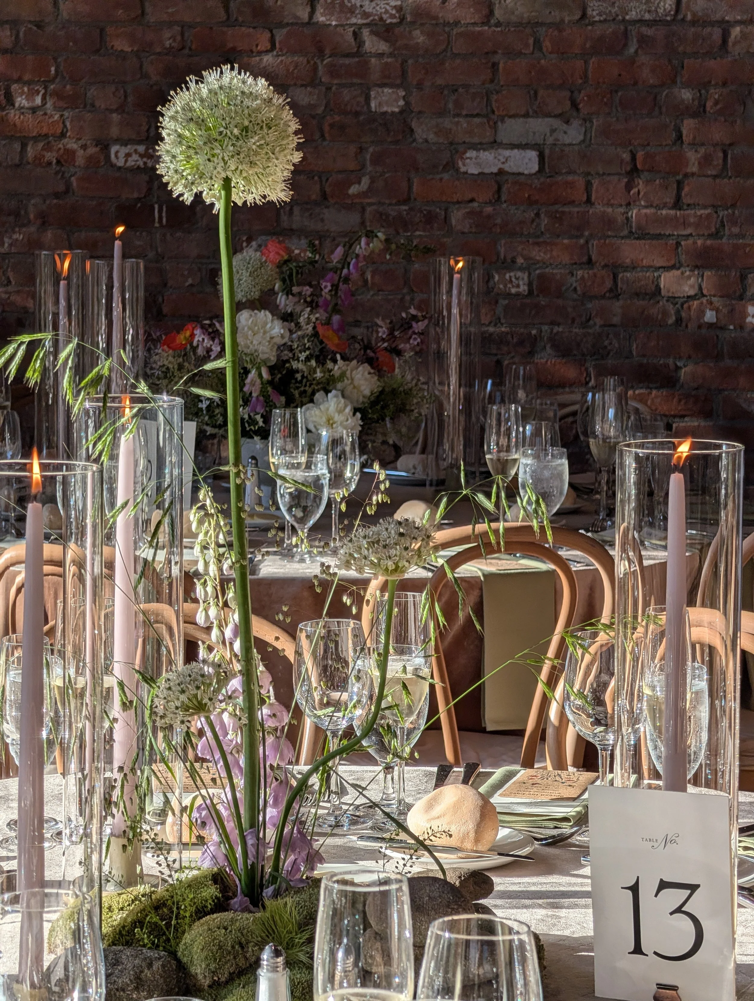  Dazzling and sculptural table display featuring tall white allium 