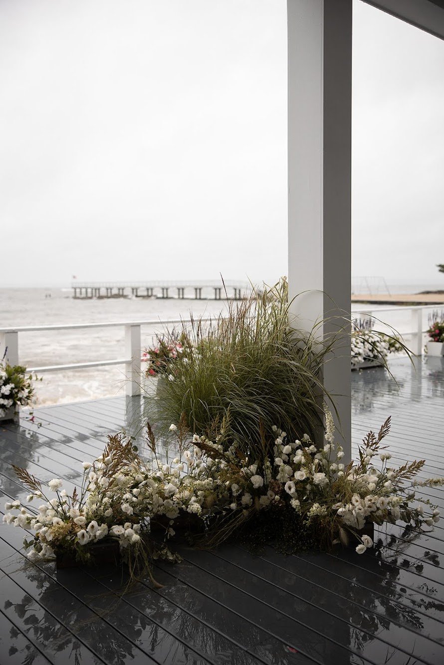  Big Whimsical composition featuring trailing greenery and small charming white flowers 