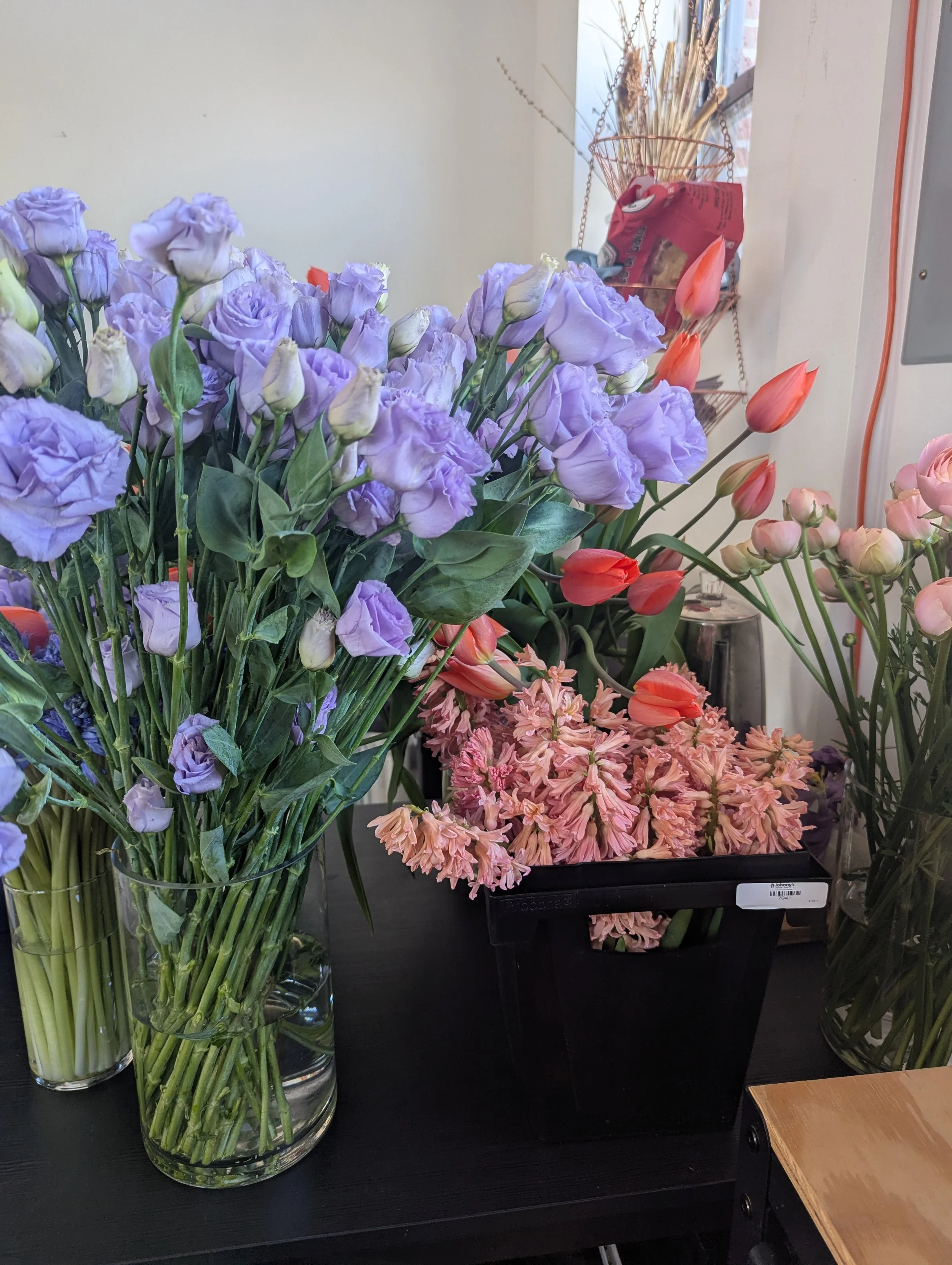  Table filled with vibrant purple lisianthus in full bloom 