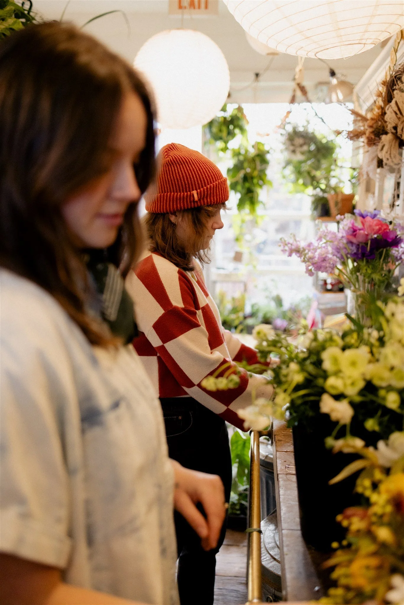 Flora Good Times team designing flower arrangements inside their Hudson Valley flower shop in Beacon, NY.