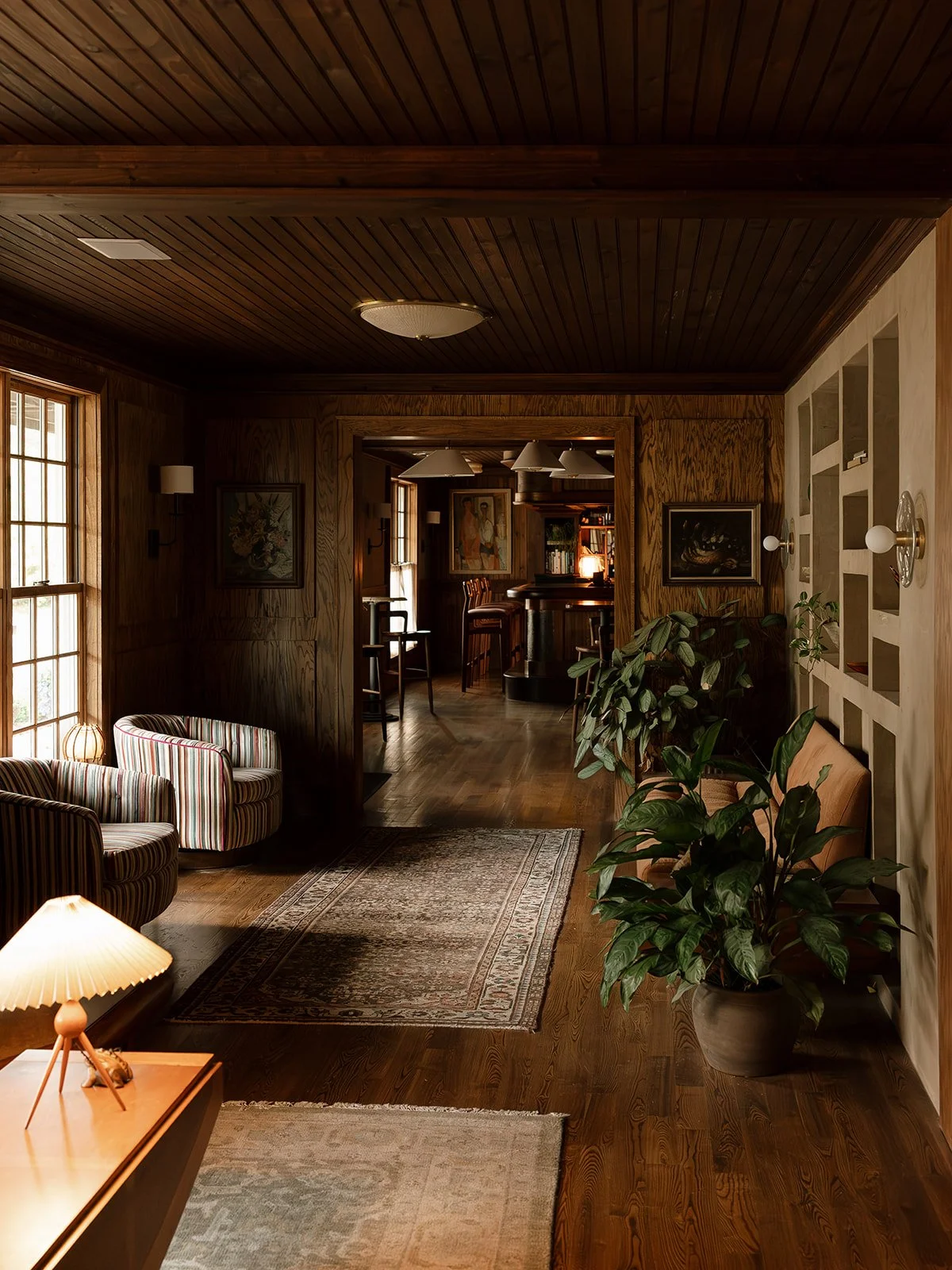 Moody interior hallway at The Henson, setting a warm, intimate backdrop for floral moments.