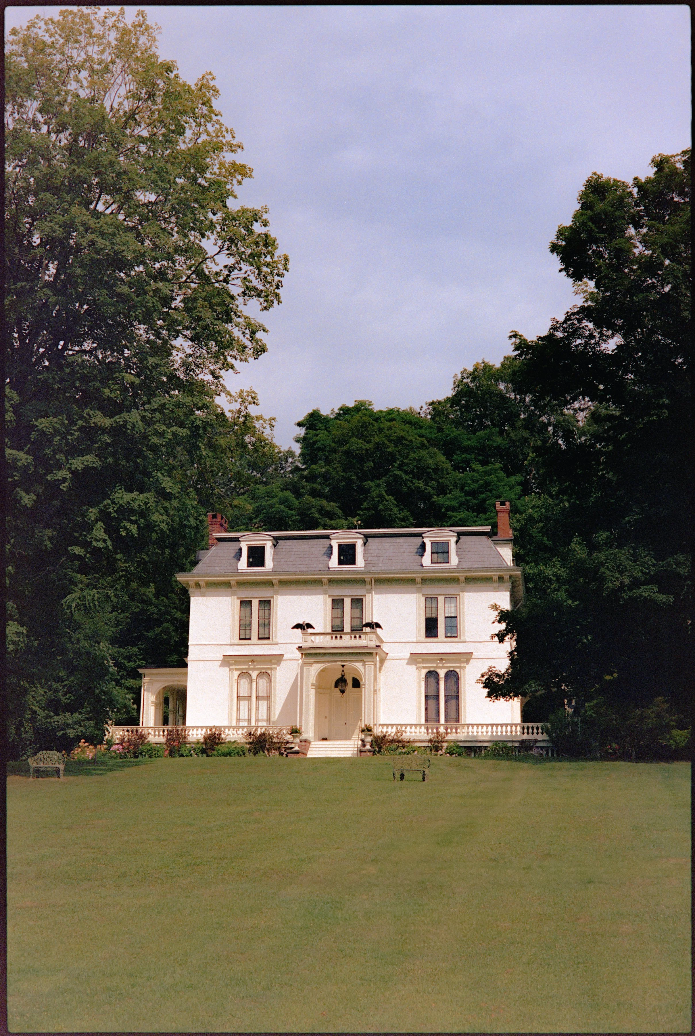 Historic private estate house surrounded by trees in Germantown, New York
