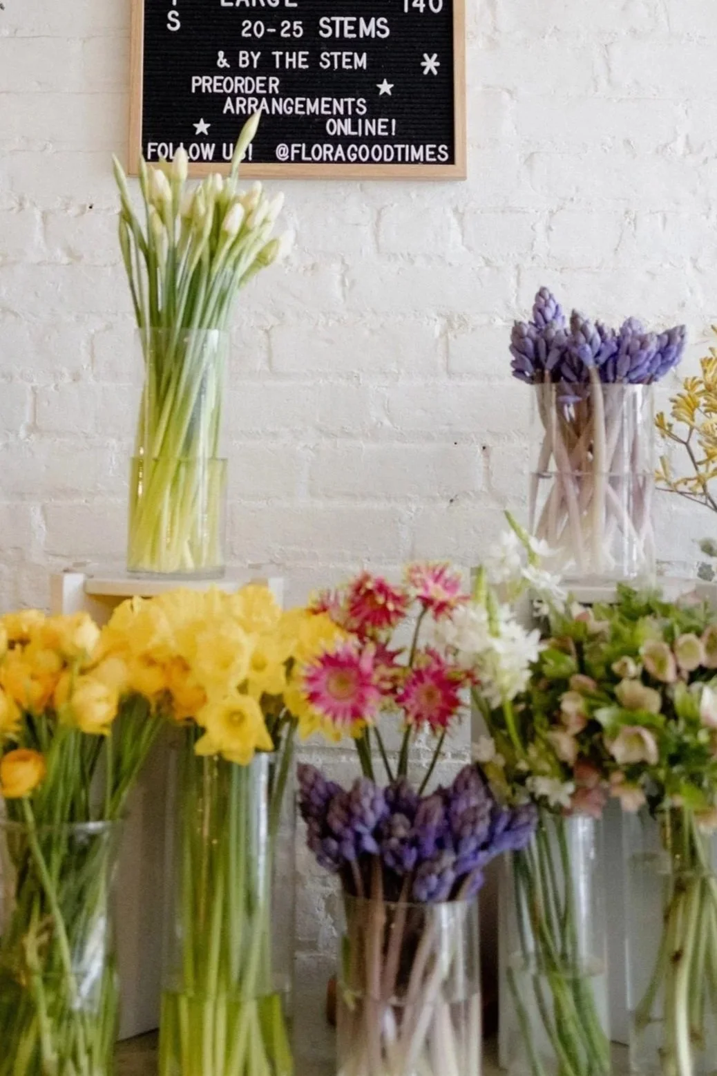 An abundant flower bar full of fresh flowers at Flora Good Times, a sustainable florist and house plant shop in Beacon, NY in the Hudson Valley